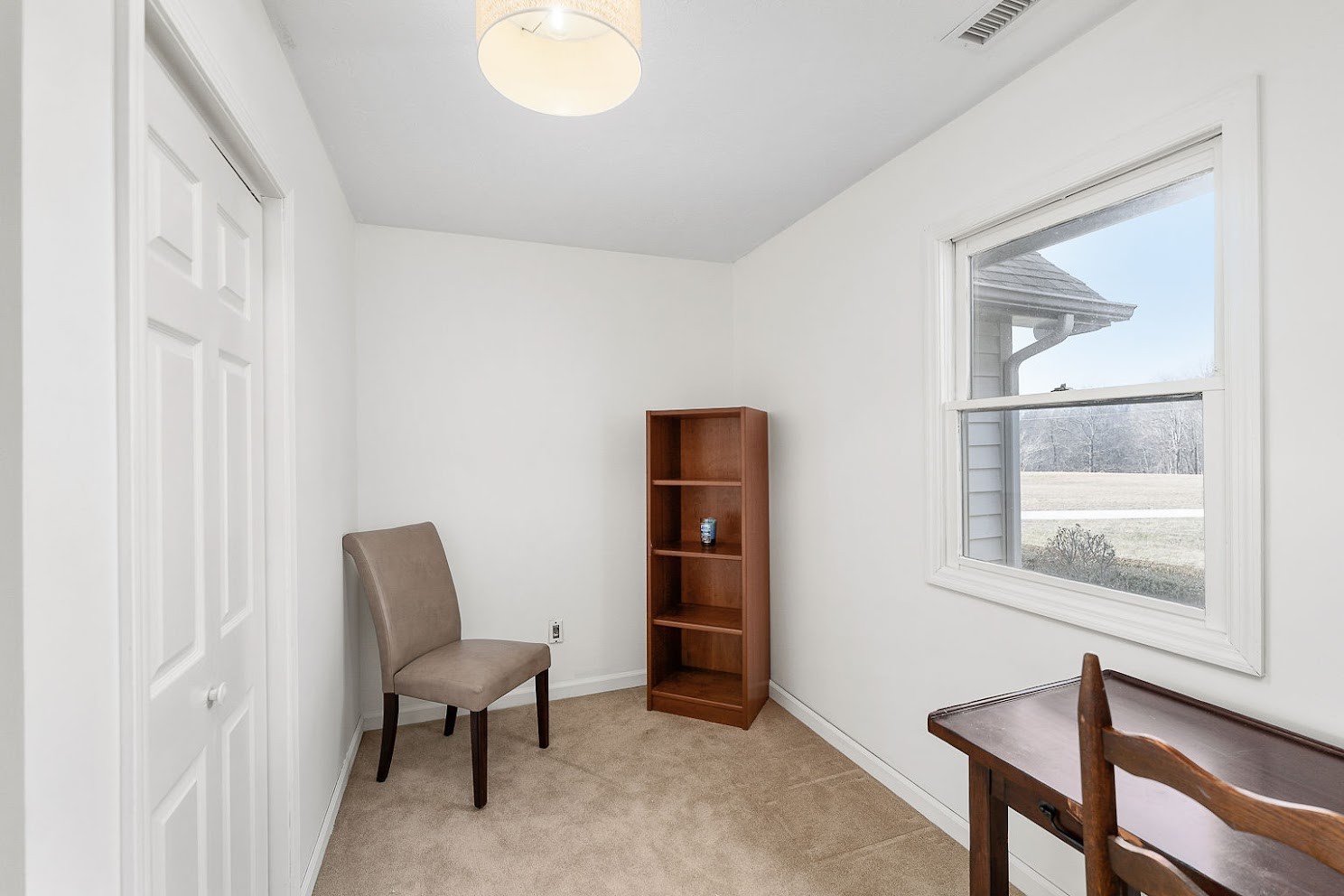 416 O'Neal Road Livingston, TN 38570 - Photo 11 of 22 a view of a workspace with furniture and a window