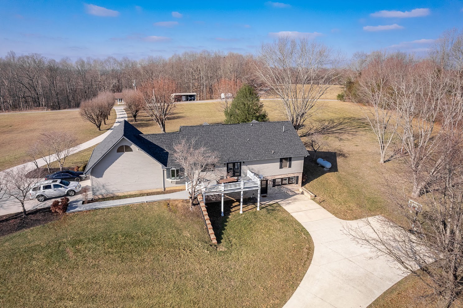416 O'Neal Road Livingston, TN 38570 - Photo 2 of 22 a terrace of a house with table and chairs
