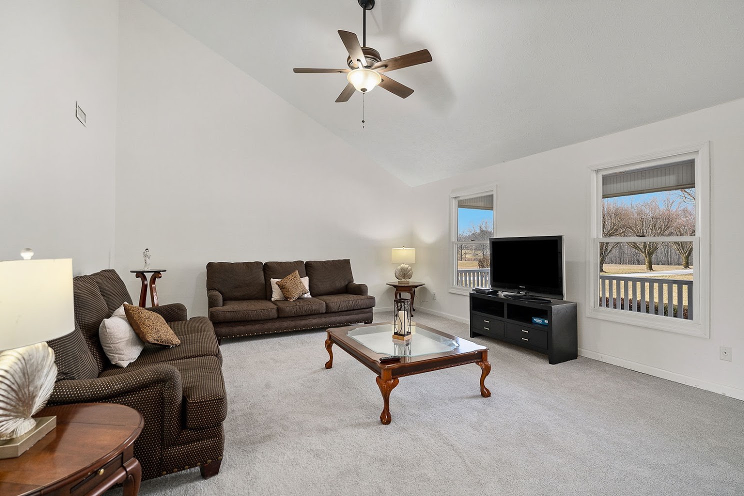 416 O'Neal Road Livingston, TN 38570 - Photo 6 of 22 a living room with furniture a ceiling fan and a window