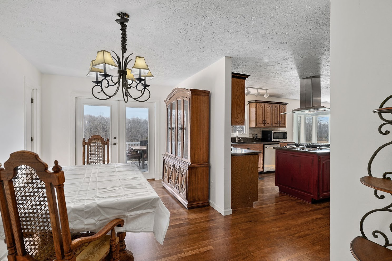 416 O'Neal Road Livingston, TN 38570 - Photo 7 of 22 a kitchen with stainless steel appliances granite countertop a refrigerator a stove and a wooden floors