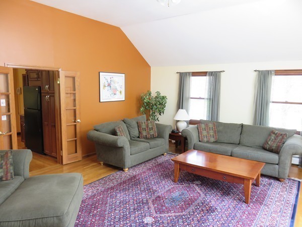 18 Nevada Road Tyngsborough, MA 01879 - Photo 9 of 22 a living room with furniture and a rug