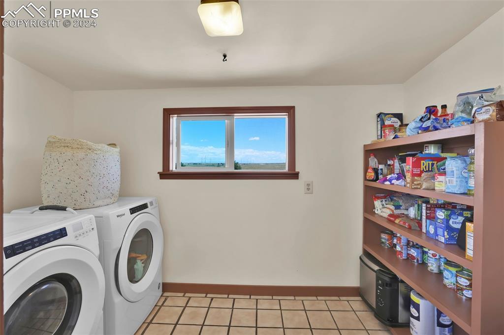 6910 Sengbeil Road Yoder, CO 80864 - Photo 11 of 50 a utility room with dryer and washer