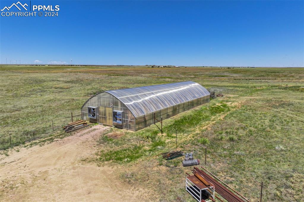 6910 Sengbeil Road Yoder, CO 80864 - Photo 40 of 50 a view of a yard with an ocean view