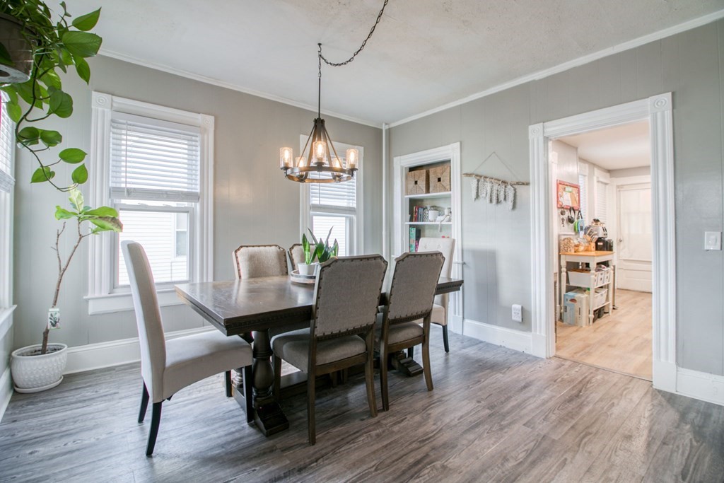 28 Rutledge Avenue Springfield, MA 01105 - Photo 11 of 22 a view of a dining room with furniture wooden floor and chandelier