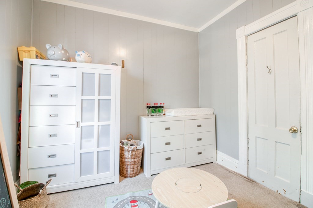 28 Rutledge Avenue Springfield, MA 01105 - Photo 20 of 22 a room with cabinets and closet