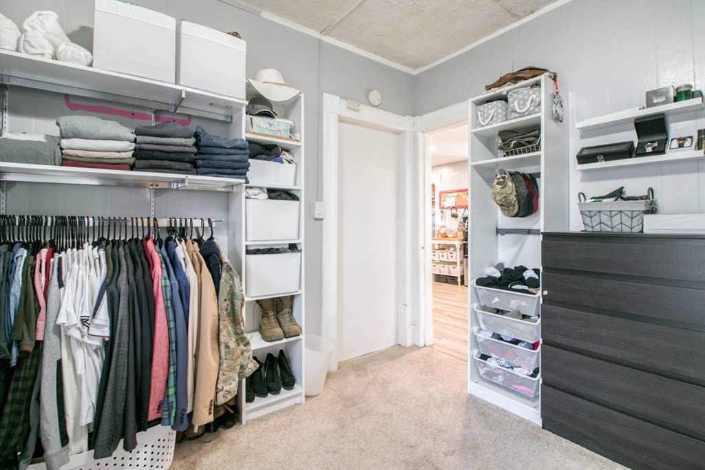 28 Rutledge Avenue Springfield, MA 01105 - Photo 22 of 22 a view of walk in closet with clothes and shoes