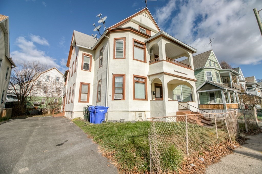 28 Rutledge Avenue Springfield, MA 01105 - Photo 3 of 22 a front view of a house with a yard