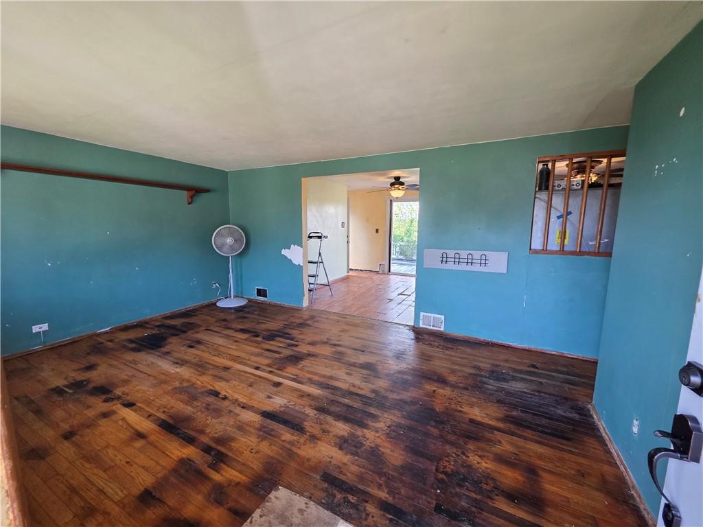 1852 Virginia Via Washington, PA 15301 - Photo 3 of 14 a bedroom with a bed and painting on the wall