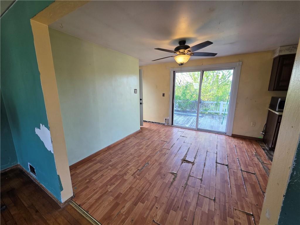 1852 Virginia Via Washington, PA 15301 - Photo 4 of 14 a view of empty room with wooden floor and fan