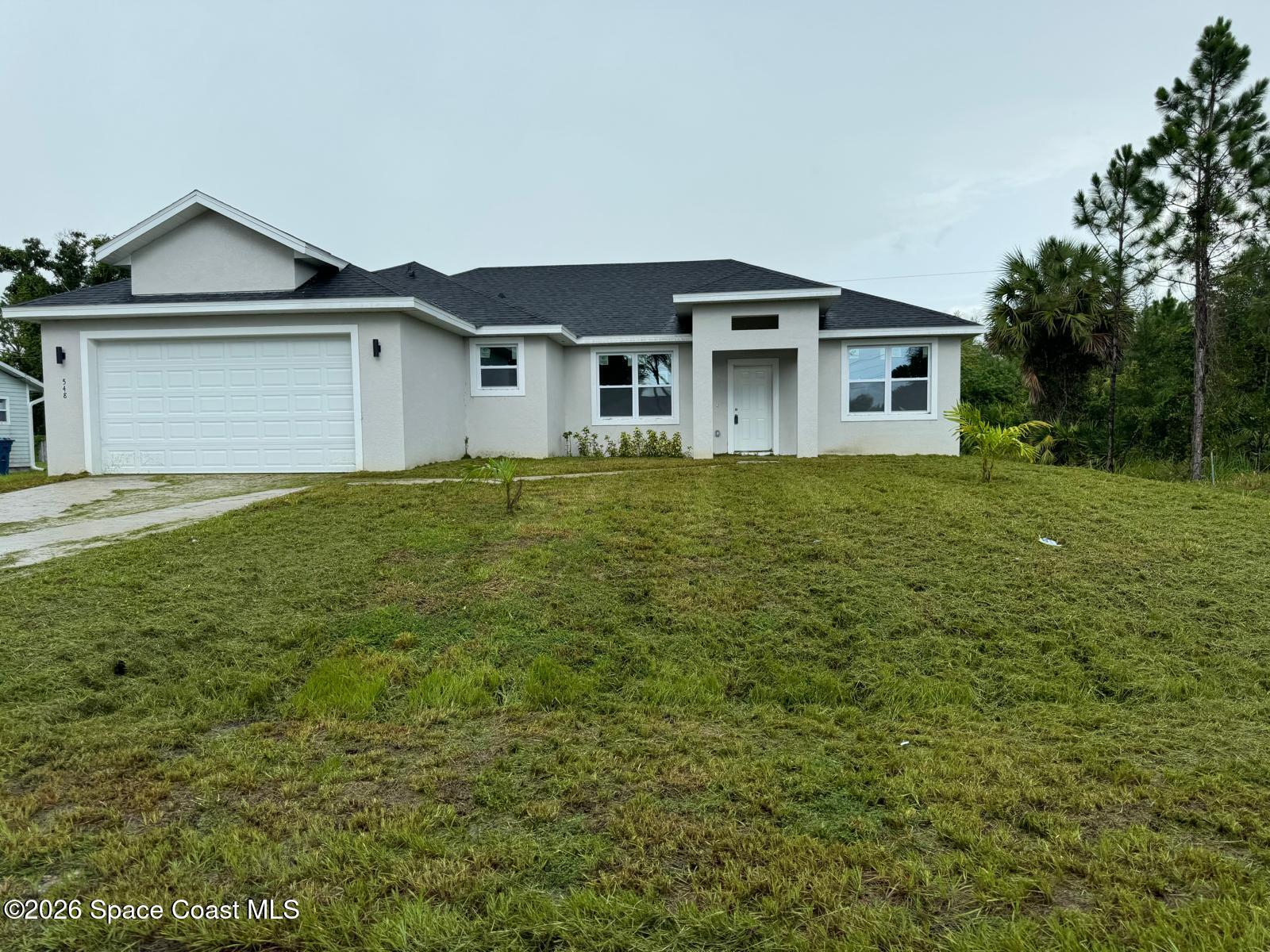 1091 Wing Road Southwest Palm Bay, FL 32908 - Photo 1 of 21 Front