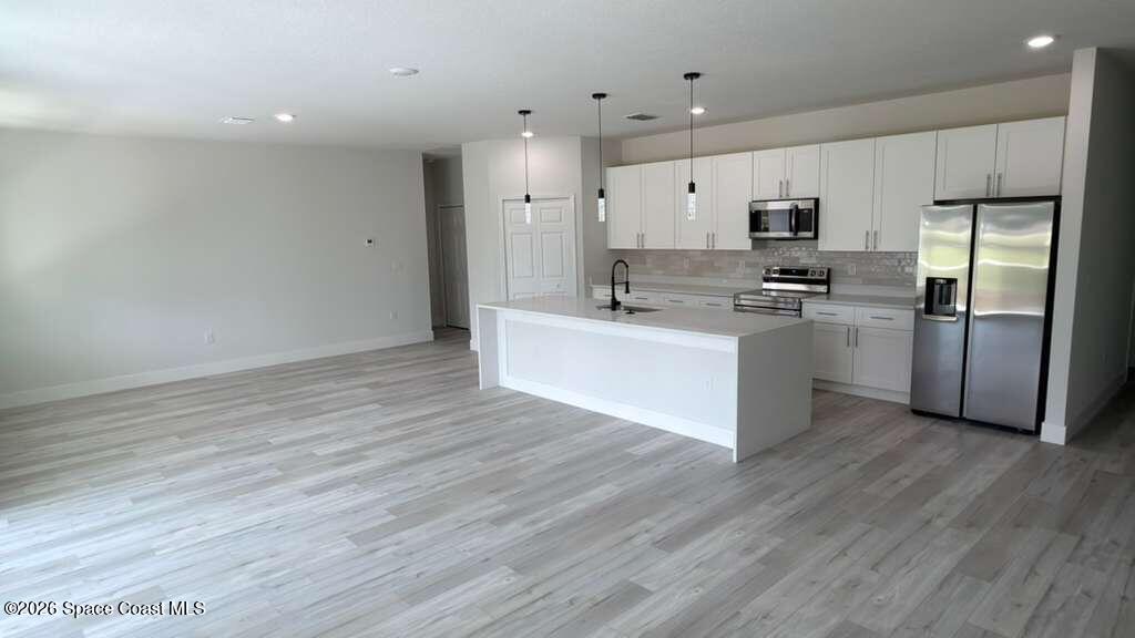 1091 Wing Road Southwest Palm Bay, FL 32908 - Photo 4 of 21 WhatsApp Image 2026-05-15 at 11.29.40 AM