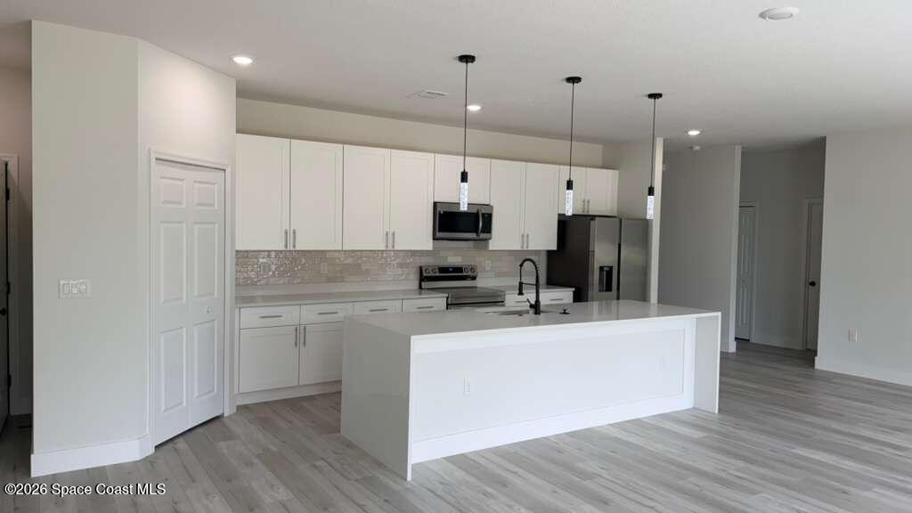 1091 Wing Road Southwest Palm Bay, FL 32908 - Photo 5 of 21 WhatsApp Image 2026-05-15 at 11.29.43 AM