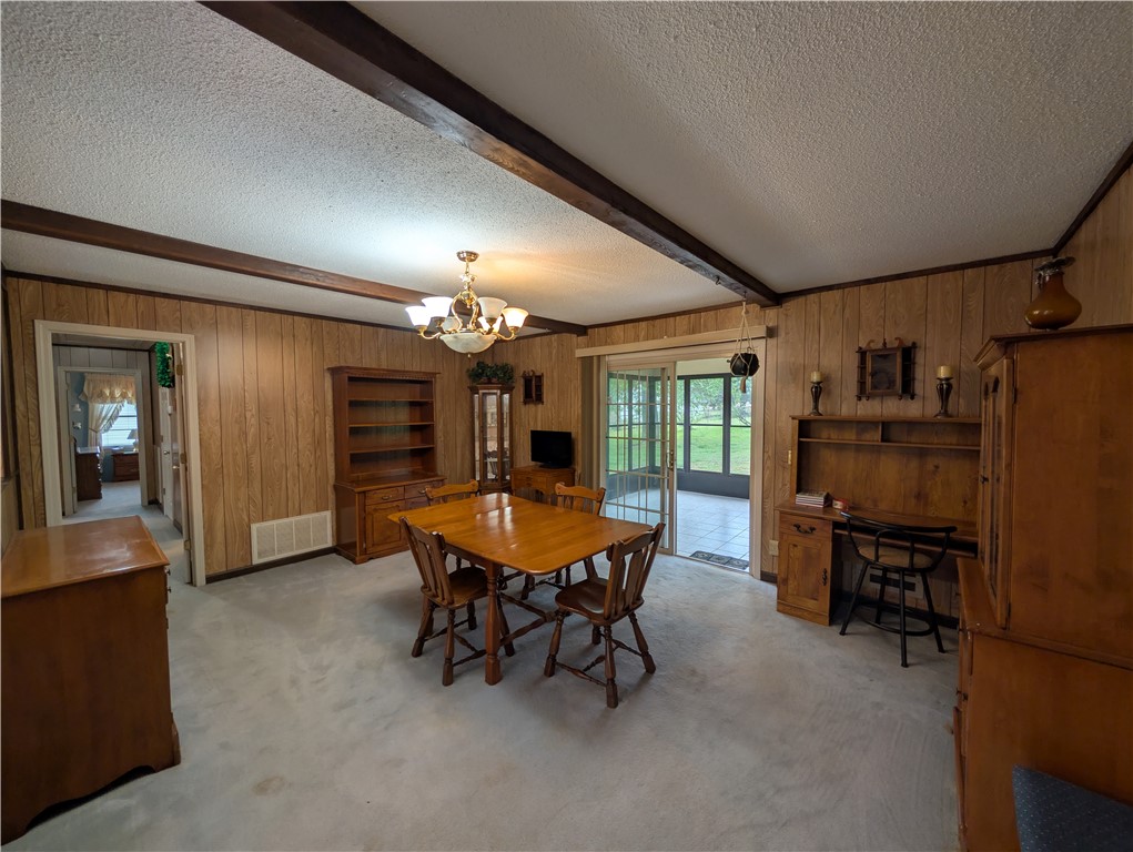 1000 Hickory Lane Anderson, SC 29624 - Photo 34 of 37 This versatile room features warm wood paneling and easy access to outdoor living.