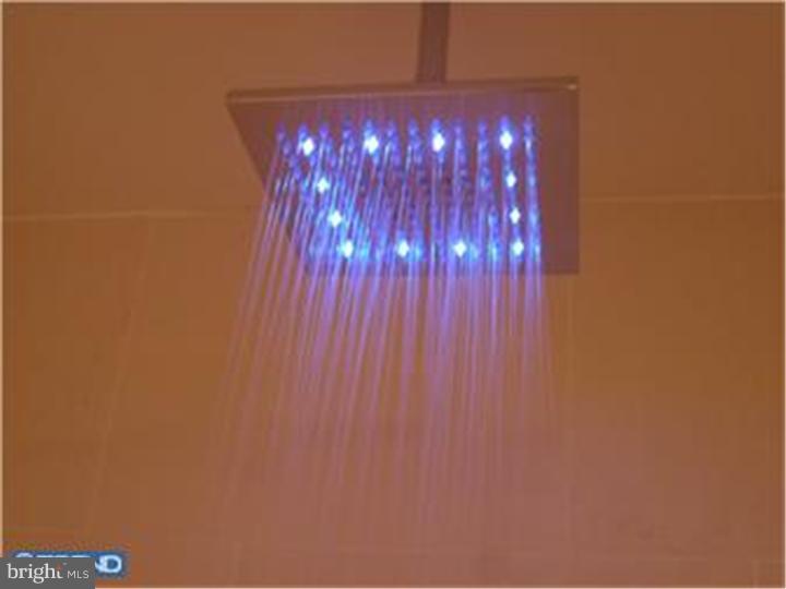 800 North 48th Street, Unit 38 Philadelphia, PA 19139 - Photo 8 of 18 a view of gallery with wooden floor