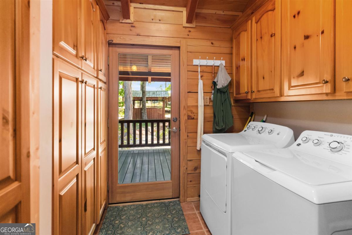 224 Harmony Road Eatonton, GA 31024 - Photo 26 of 68 a utility room with dryer and washer