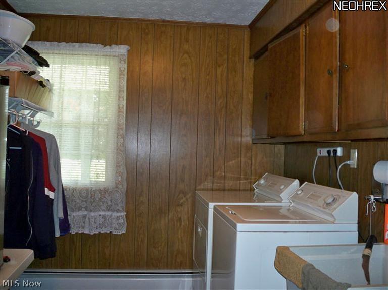 2006 Frost Road Streetsboro, OH 44241 - Photo 12 of 25 1st floor laundry room includes washer and dryer and sink access to the family room and attached garage