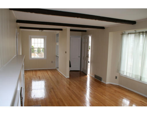 111 Arthur Street Springfield, MA 01104 - Photo 2 of 3 a view interior of a house with wooden floor and windows