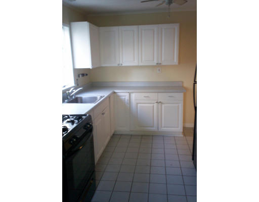 111 Arthur Street Springfield, MA 01104 - Photo 3 of 3 a kitchen with a sink and cabinets
