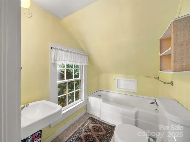 a bathroom with a sink and a bathtub