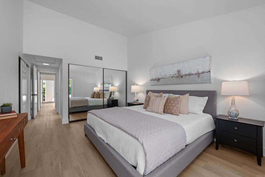 17823 Avenida Alozdra San Diego, CA 92128 - Photo 15 of 28 a bed room with bed and a night stand