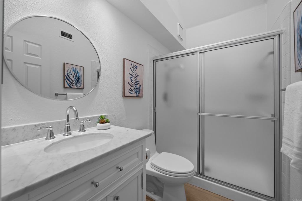 17823 Avenida Alozdra San Diego, CA 92128 - Photo 17 of 28 a bathroom with a sink and a mirror