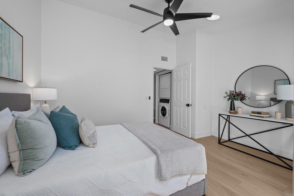 17823 Avenida Alozdra San Diego, CA 92128 - Photo 20 of 28 a bedroom with a bed and a dresser