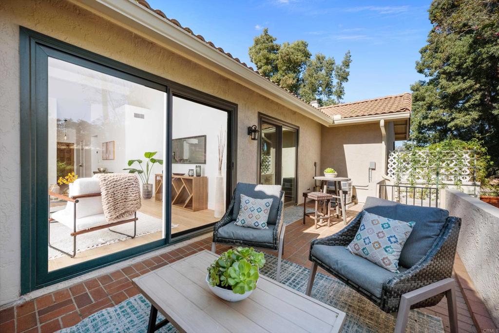 17823 Avenida Alozdra San Diego, CA 92128 - Photo 2 of 28 a outdoor living space with furniture and a potted plant