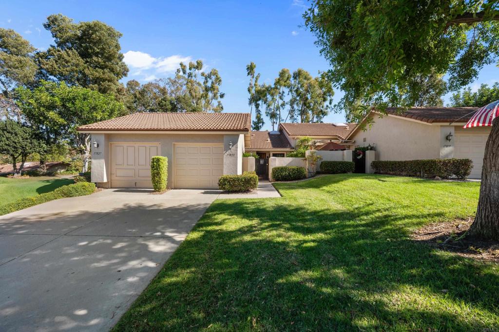 17823 Avenida Alozdra San Diego, CA 92128 - Photo 24 of 28 a view of a house with backyard and a tree
