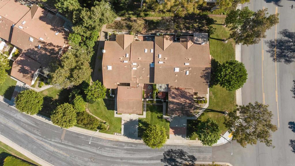 17823 Avenida Alozdra San Diego, CA 92128 - Photo 5 of 28 a view of a house with a flower garden