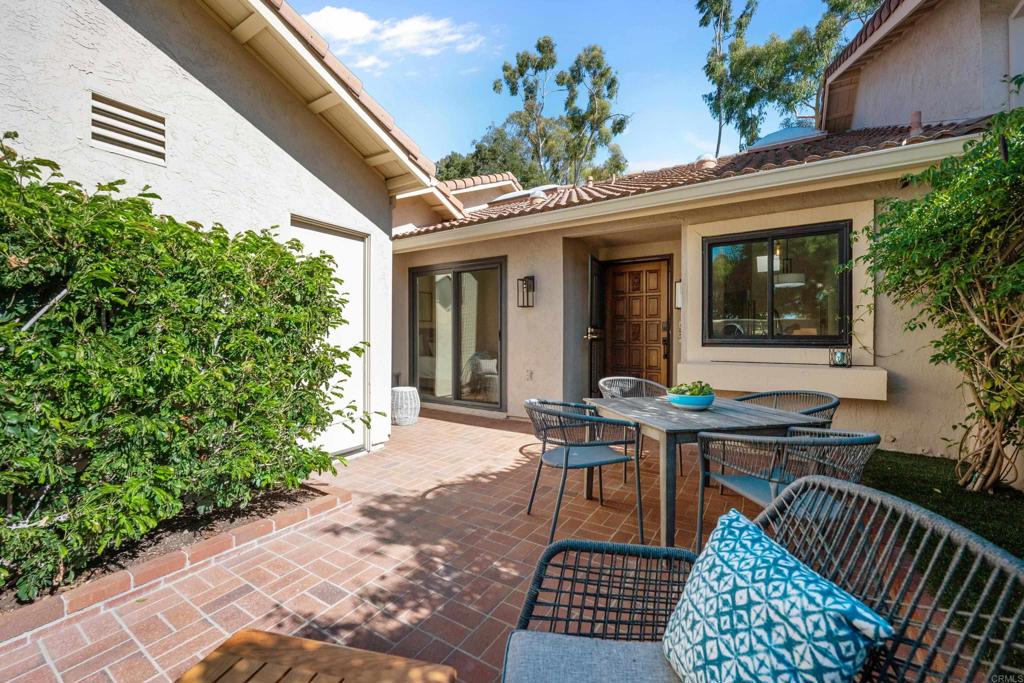 17823 Avenida Alozdra San Diego, CA 92128 - Photo 6 of 28 a view of a house with backyard and sitting area