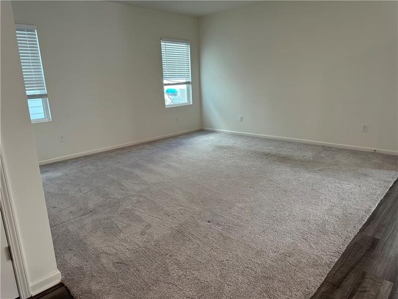 114 Feeney Street Bethlehem, GA 30620 - Photo 7 of 14 an empty room with a window