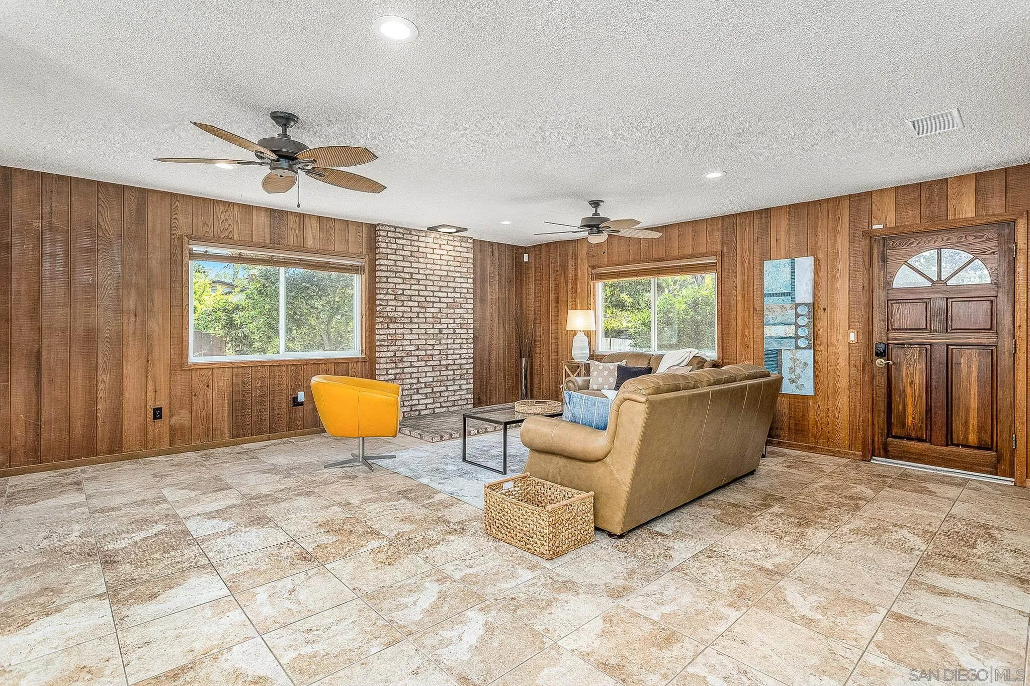 781 North Stage Coach Lane Fallbrook, CA 92028 - Photo 11 of 35 a living room with furniture and a large window