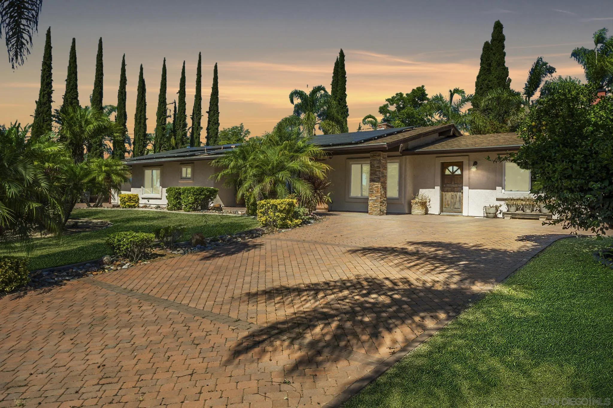 781 North Stage Coach Lane Fallbrook, CA 92028 - Photo 3 of 35 a front view of a house with garden
