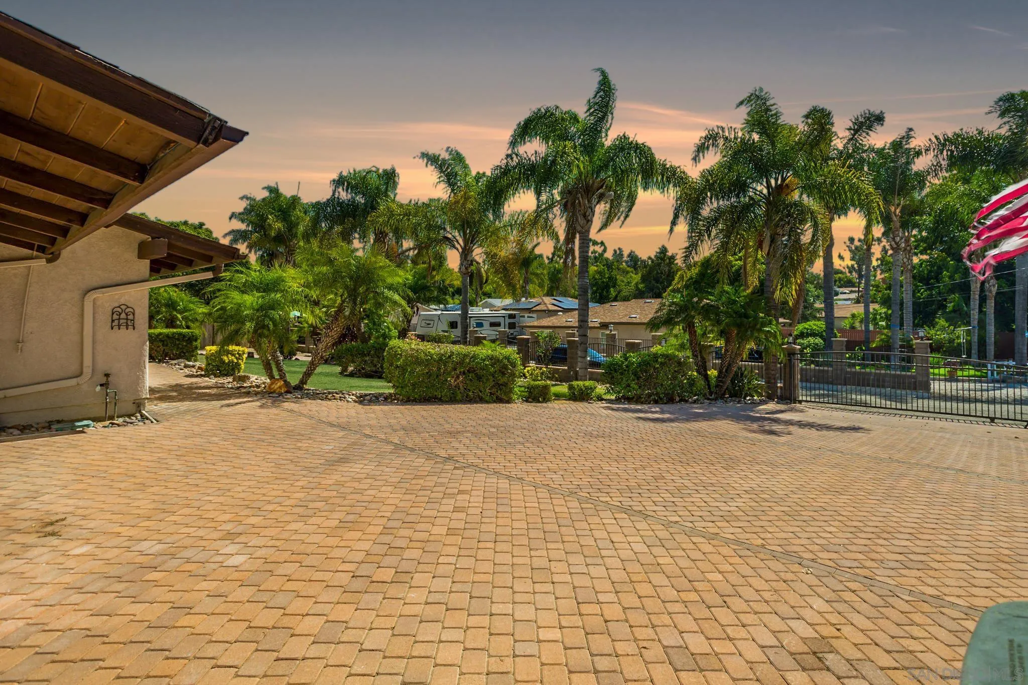 781 North Stage Coach Lane Fallbrook, CA 92028 - Photo 32 of 35 a backyard of a house with palm trees