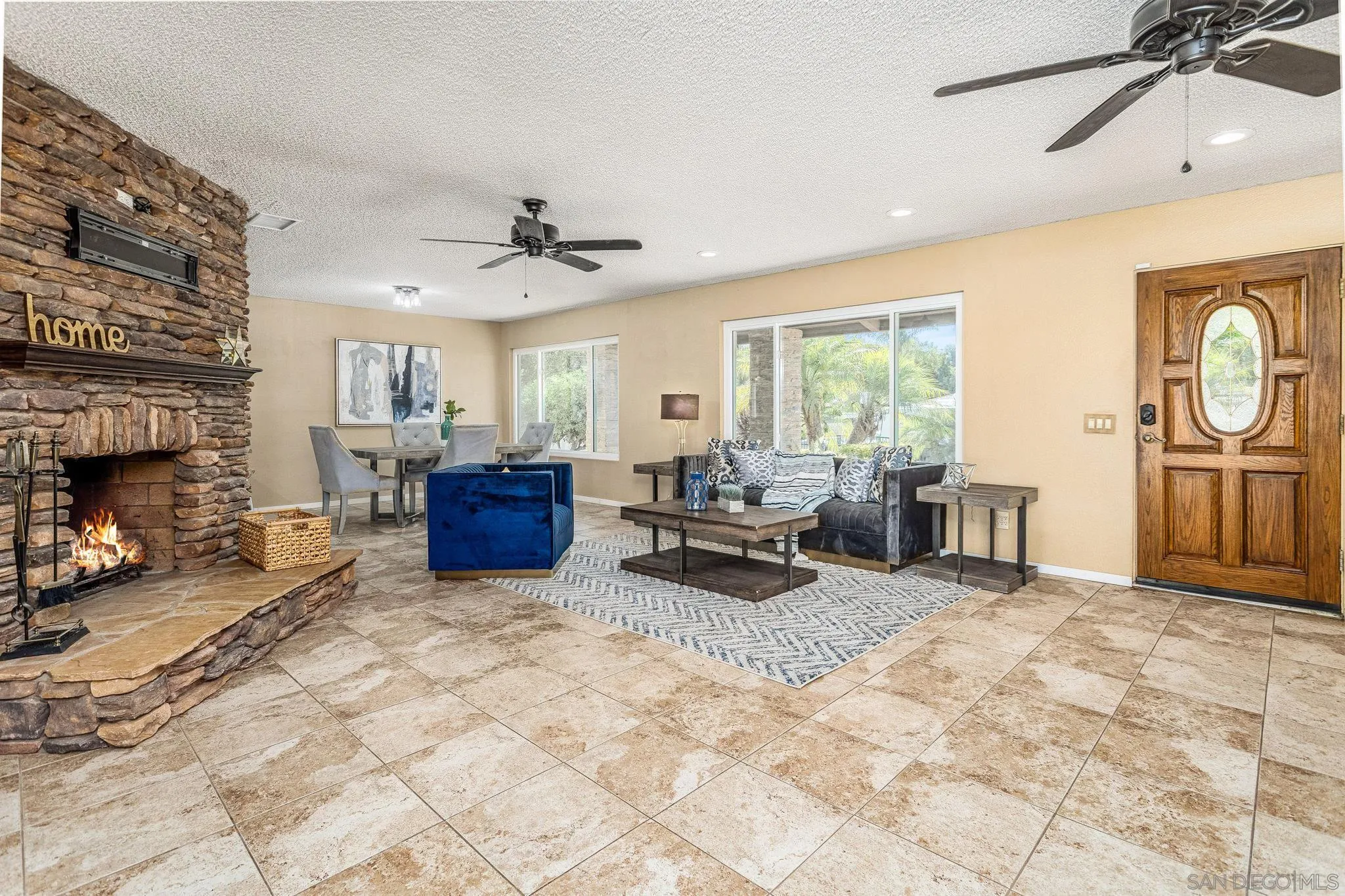 781 North Stage Coach Lane Fallbrook, CA 92028 - Photo 10 of 35 a living room with furniture and a fireplace