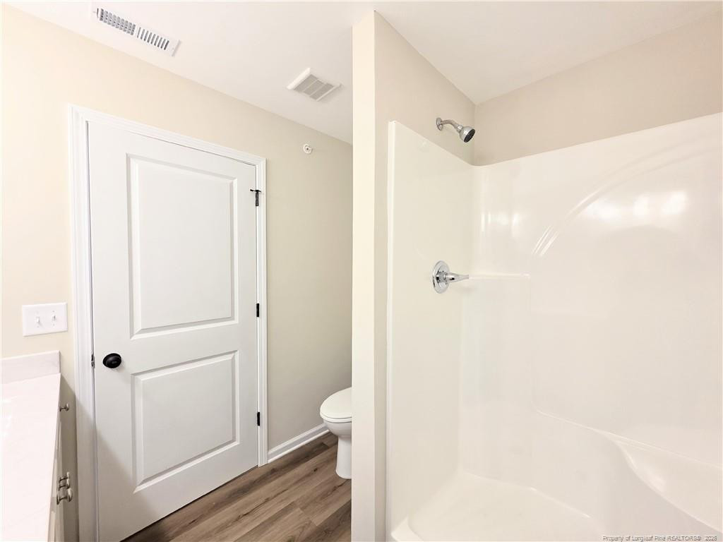 1511 Fort Bragg Road, Unit E Fayetteville, NC 28305 - Photo 12 of 15 a bathroom with a shower and a sink