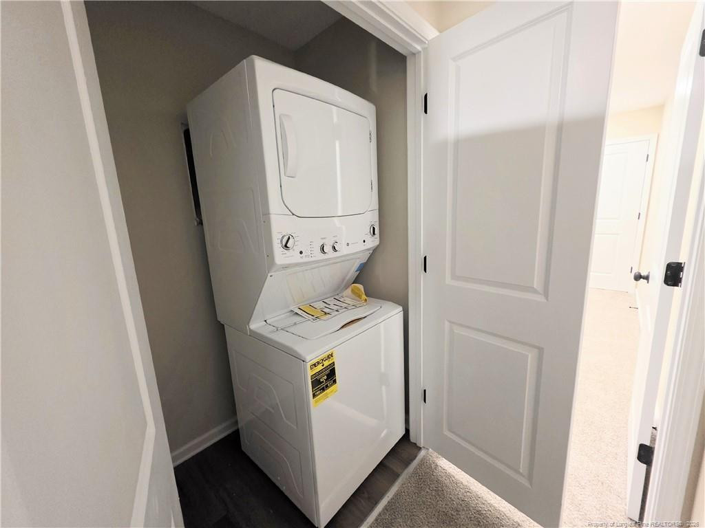 1511 Fort Bragg Road, Unit E Fayetteville, NC 28305 - Photo 13 of 15 a utility room with dryer and washer