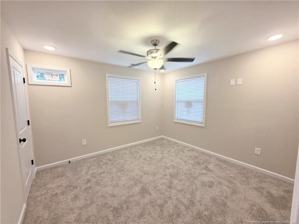 1511 Fort Bragg Road, Unit E Fayetteville, NC 28305 - Photo 10 of 15 a view of an empty room with a window