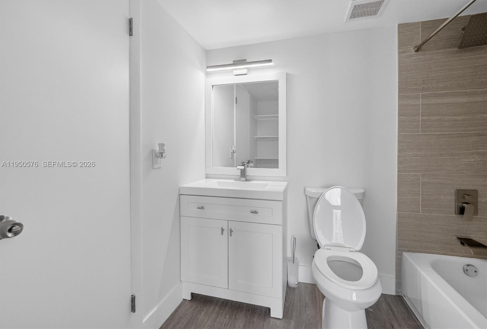 2075 Southwest 122nd Avenue, Unit 531 Miami, FL 33175 - Photo 14 of 27 a bathroom with a sink toilet and shower