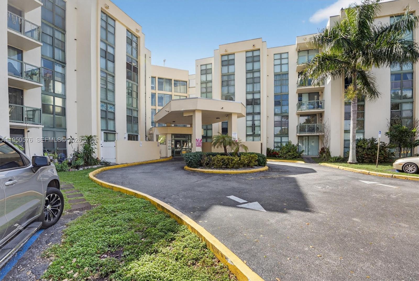 2075 Southwest 122nd Avenue, Unit 531 Miami, FL 33175 - Photo 24 of 27 a front view of a building with yard