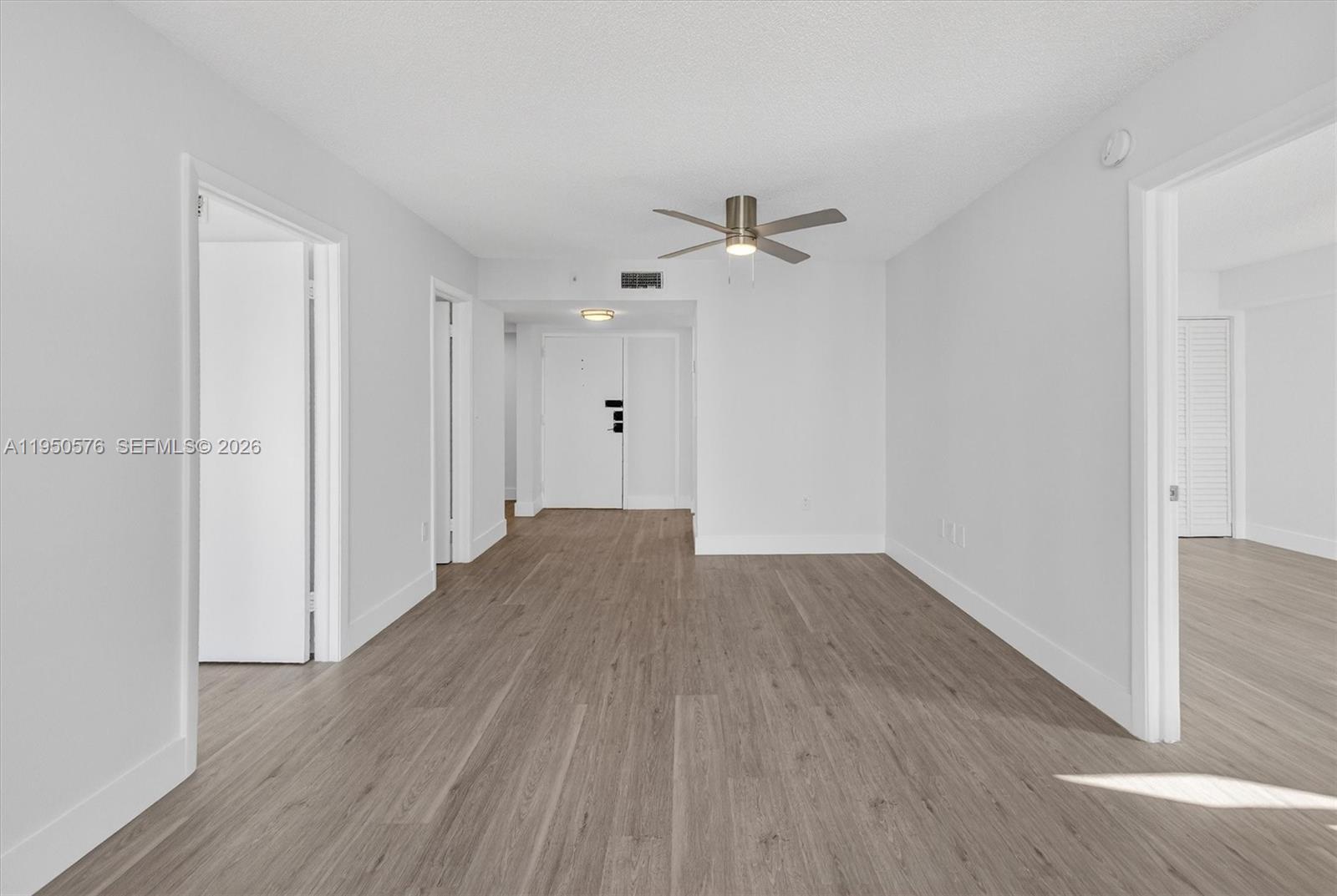 2075 Southwest 122nd Avenue, Unit 531 Miami, FL 33175 - Photo 4 of 27 a view of empty room with wooden floor