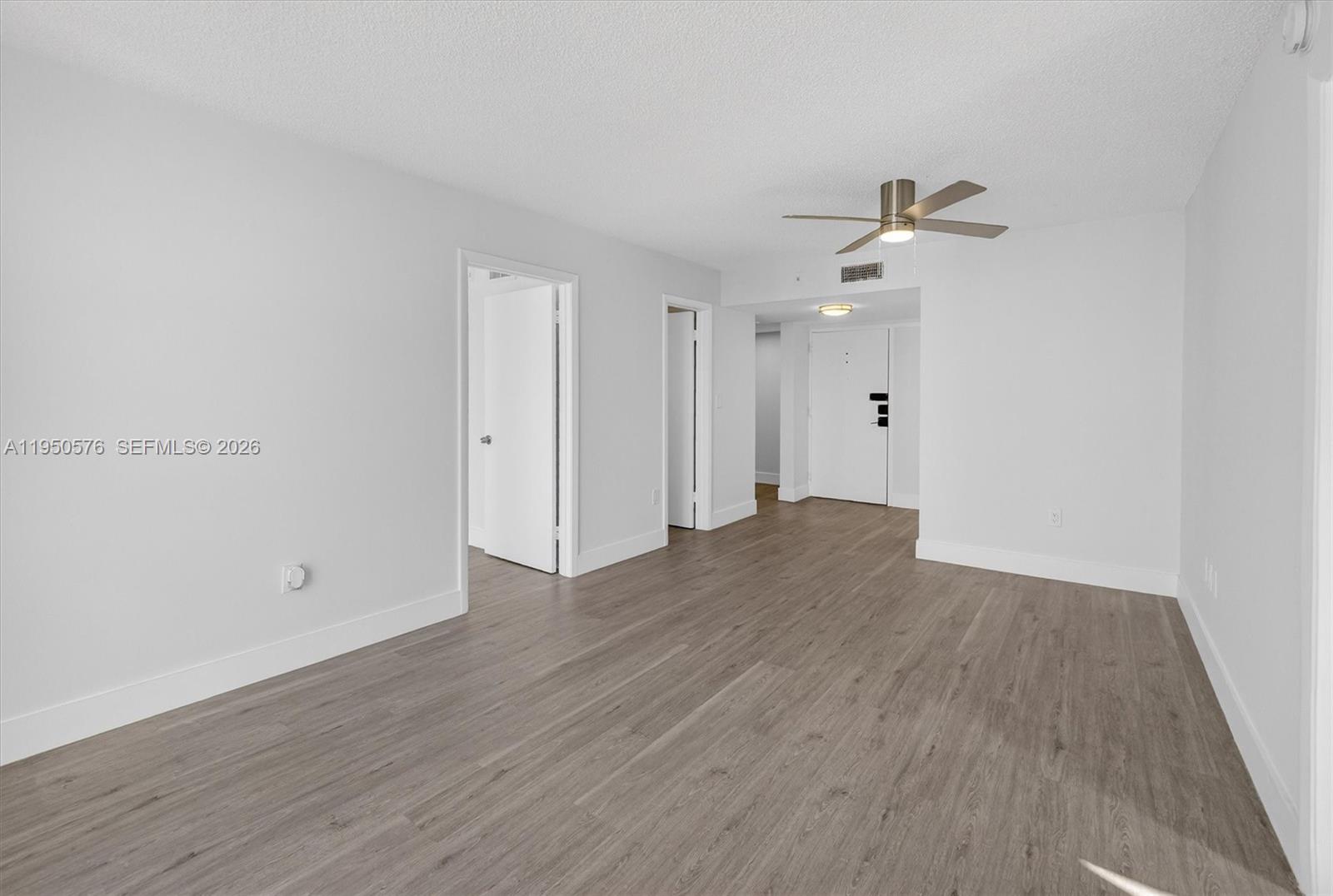 2075 Southwest 122nd Avenue, Unit 531 Miami, FL 33175 - Photo 5 of 27 wooden floor in an empty room