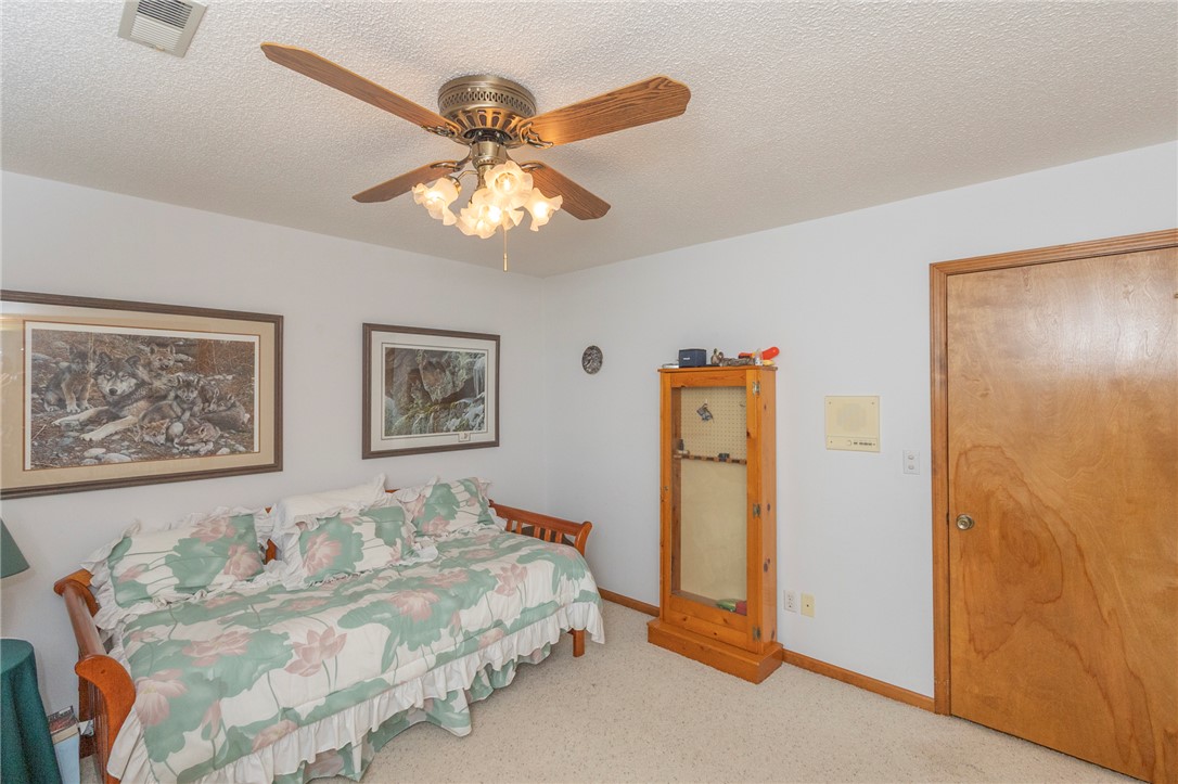 202 Plantation Point Anderson, SC 29625 - Photo 23 of 48 A quiet secondary bedroom offering a simple retreat with soft carpet flooring.