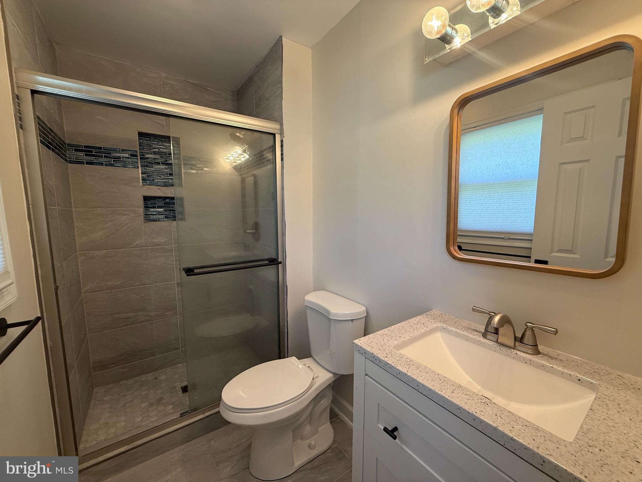 736 Hillmeade Road Edgewater, MD 21037 - Photo 20 of 34 Modern bathroom with sleek finishes.