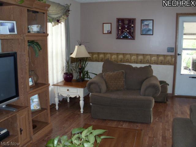 4076 Beckley Road Stow, OH 44224 - Photo 2 of 25 The large living room has plenty of room for family and friends.