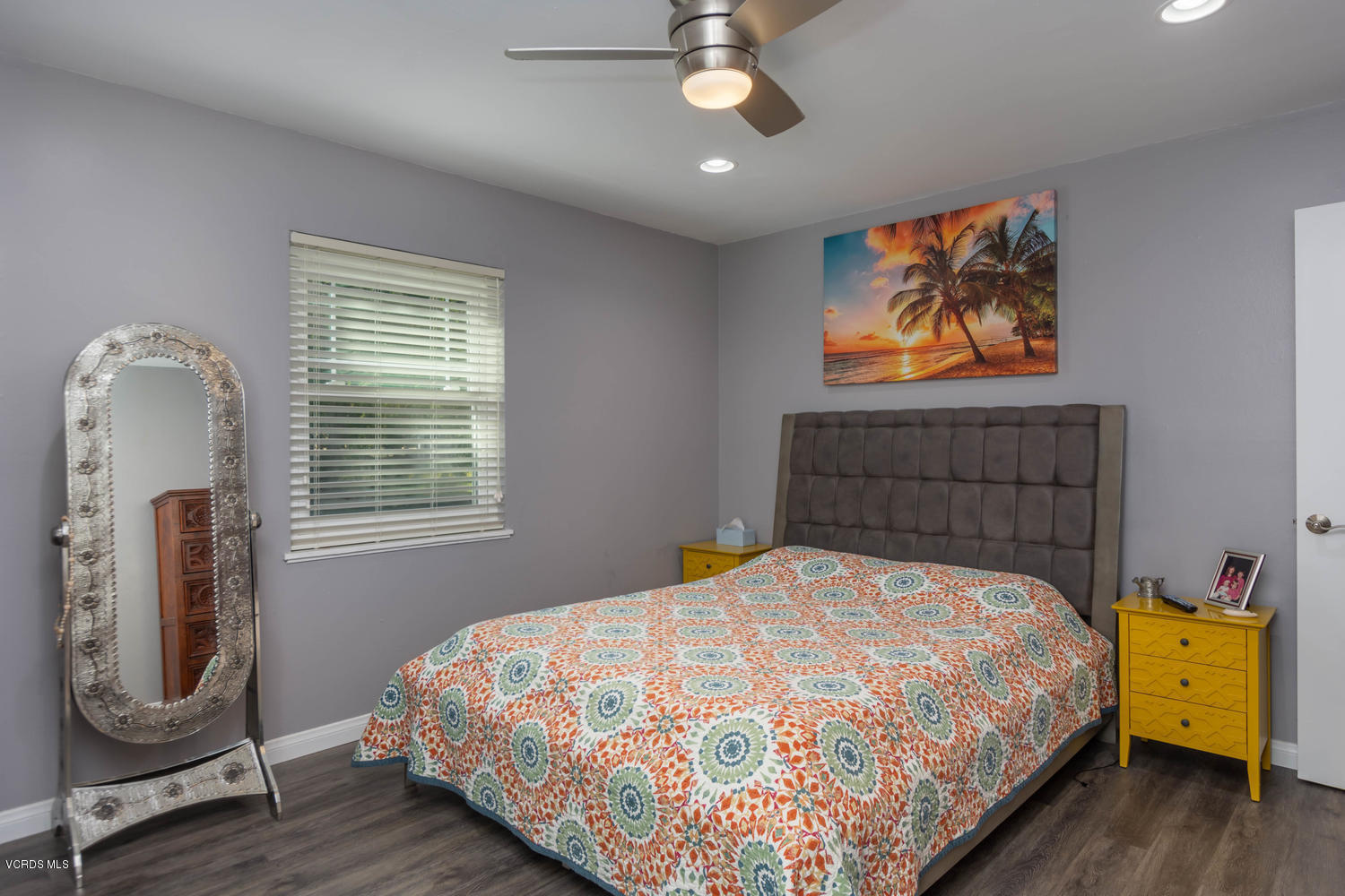 919 Laurel Road Santa Paula, CA 93060 - Photo 15 of 21 a bedroom with a bed and wooden floor