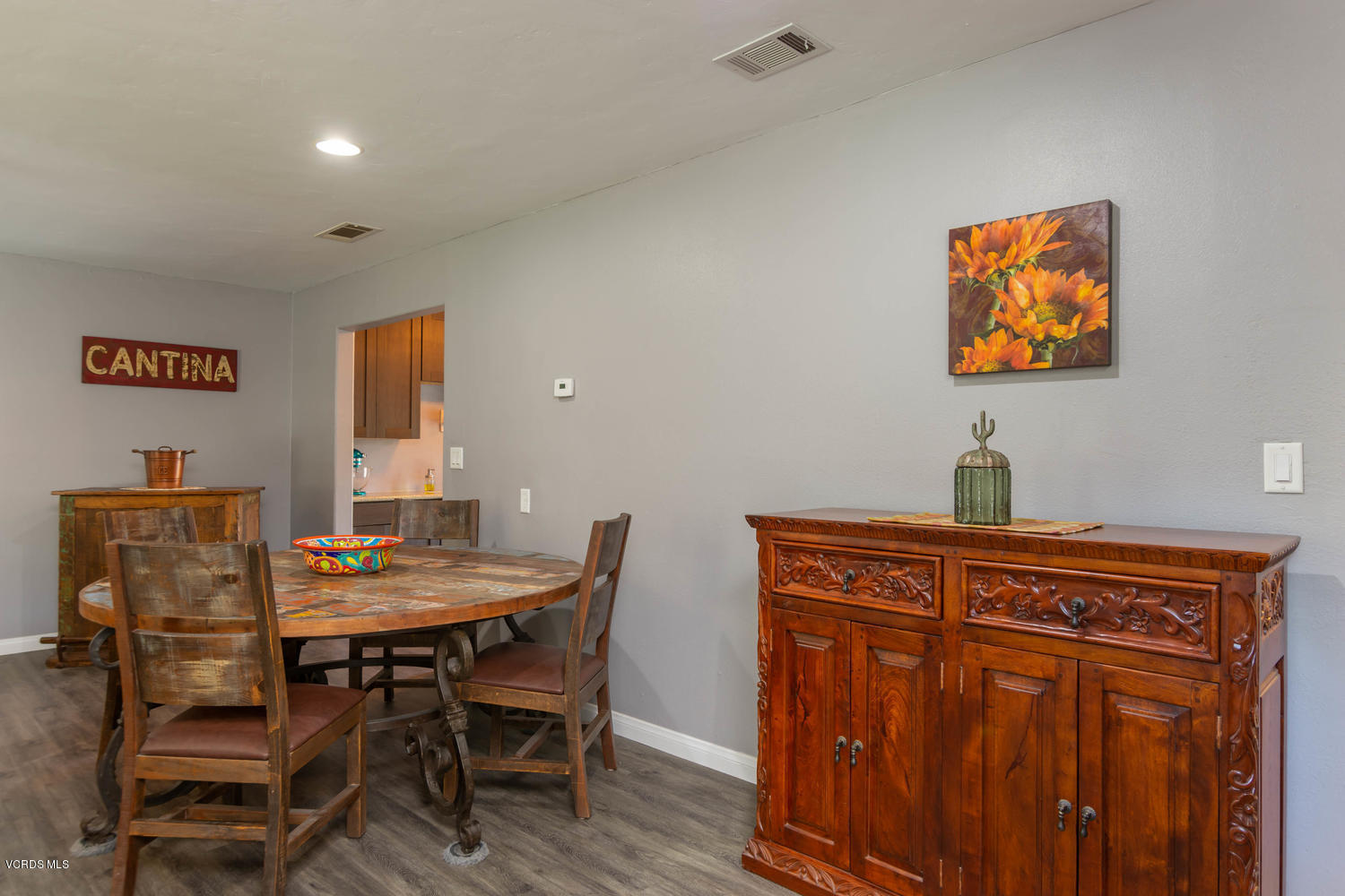 919 Laurel Road Santa Paula, CA 93060 - Photo 8 of 21 a view of a dining room with furniture and wooden floor