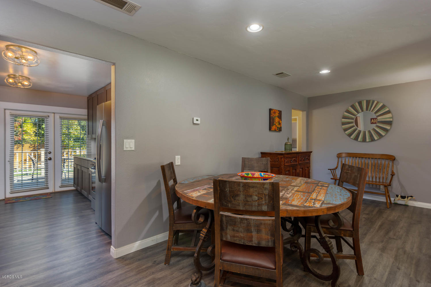 919 Laurel Road Santa Paula, CA 93060 - Photo 9 of 21 a view of a dining room with furniture and wooden floor