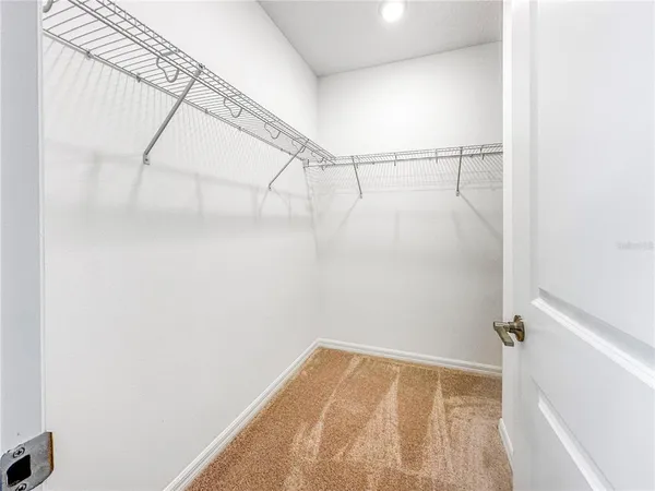 a view of a room with racks on the wall