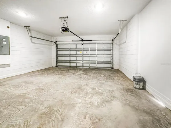 a view of a garage with stairs